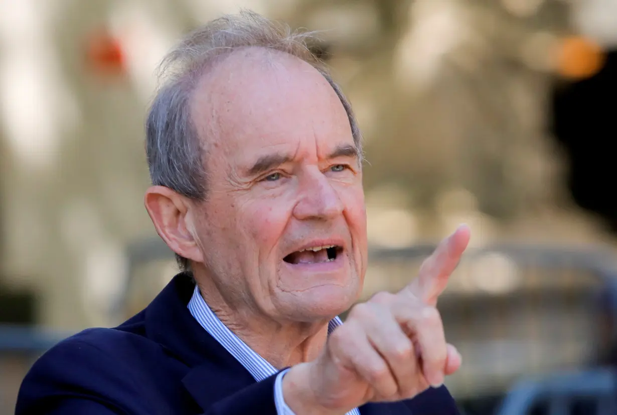 FILE PHOTO: Lawyer David Boies walks out of the Southern District of New York court, in New York