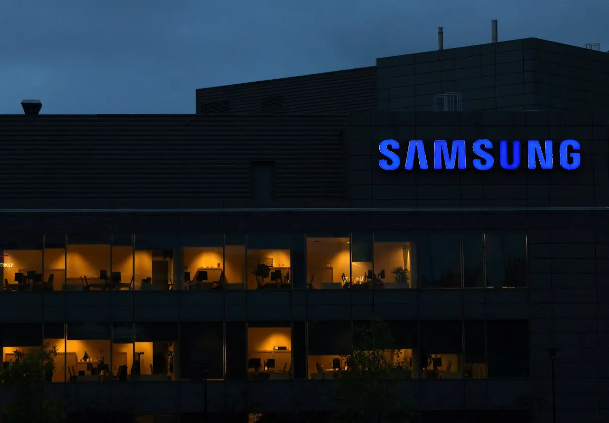 The logo of Samsung is seen on the top of a Brussels' office of the company in Diegem