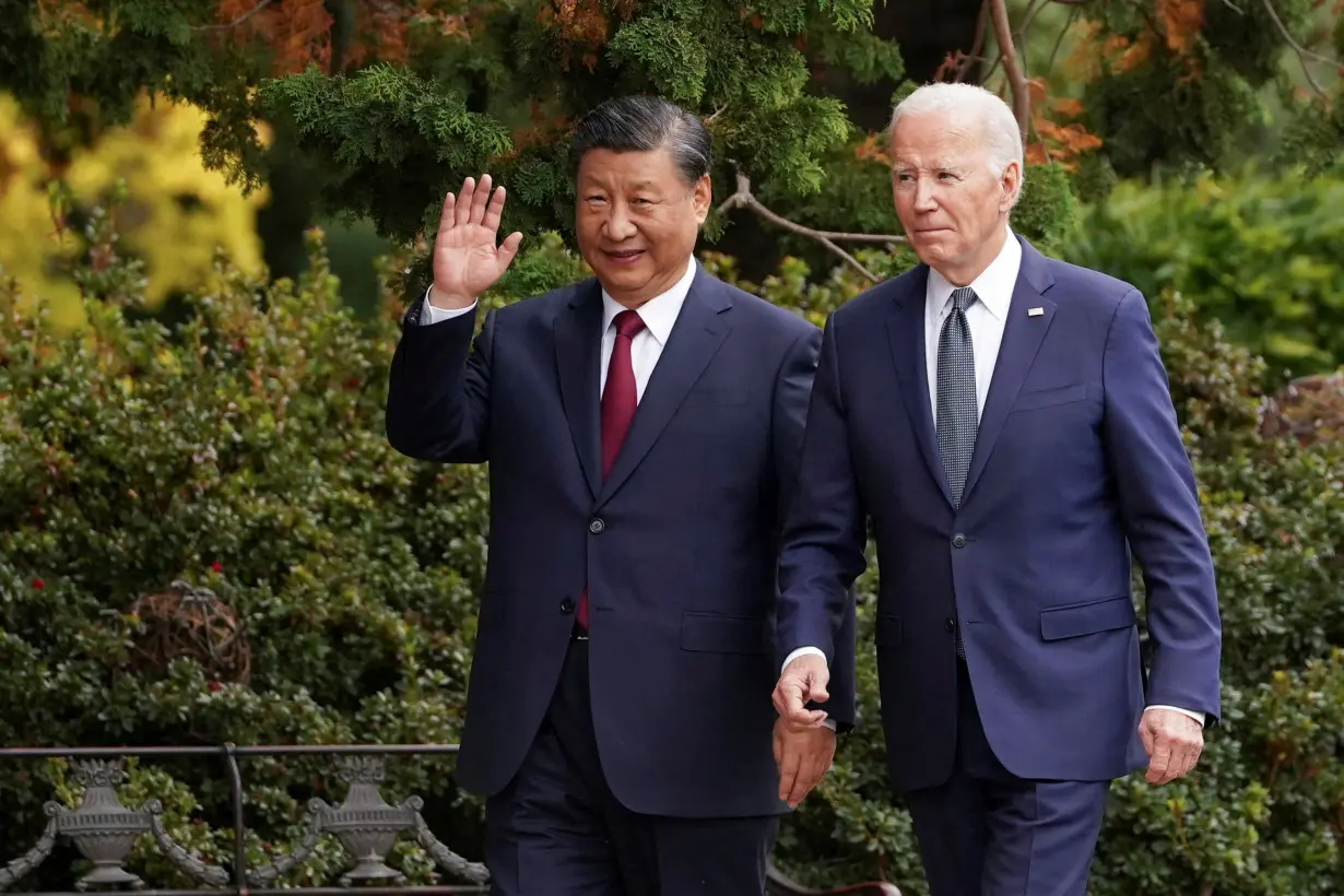 FILE PHOTO: U.S. President Joe Biden meets with Chinese President Xi Jinping on the sidelines of APEC summit, in Woodside