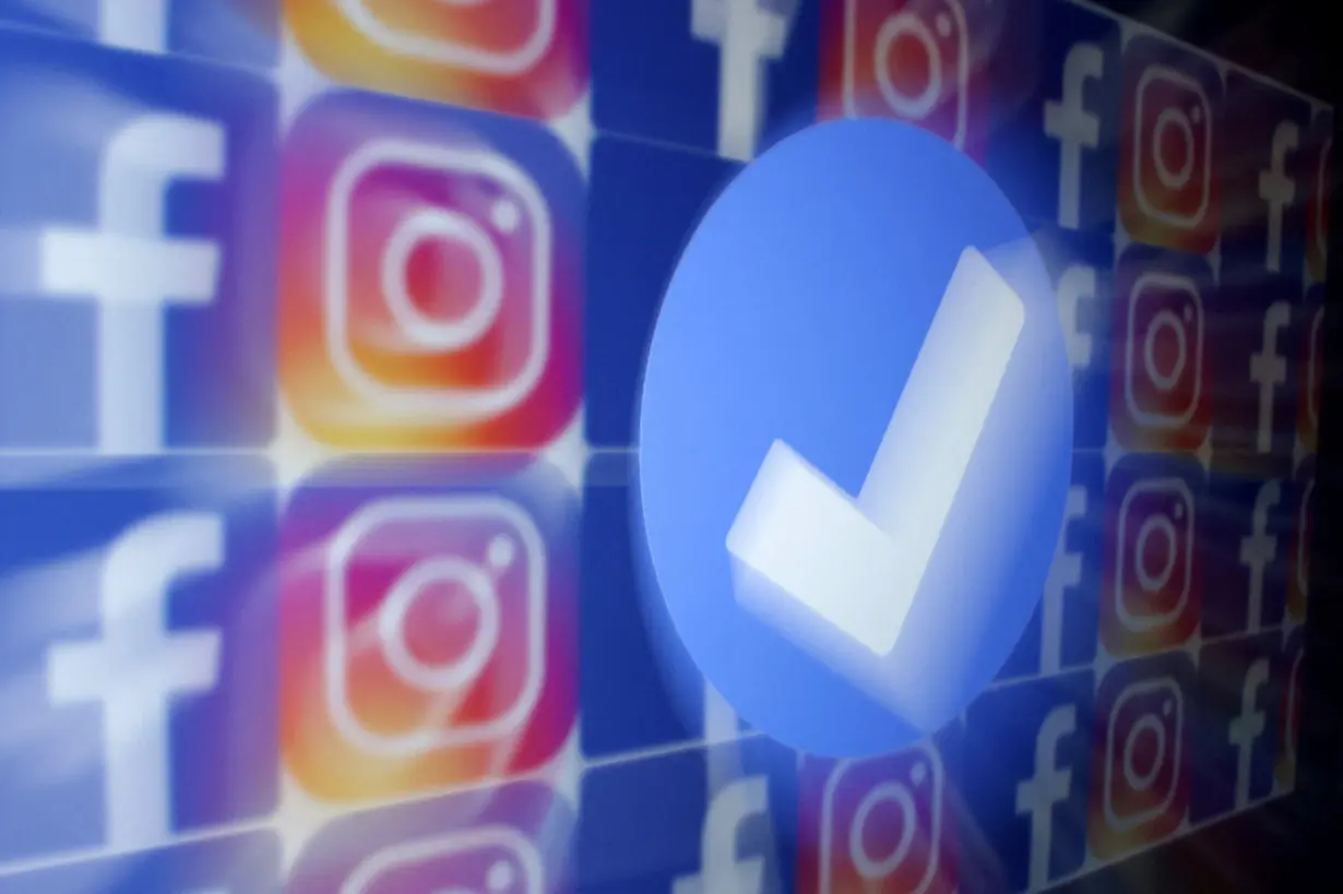 FILE PHOTO: Illustration shows blue verification badge, Facebook and Instagram logos