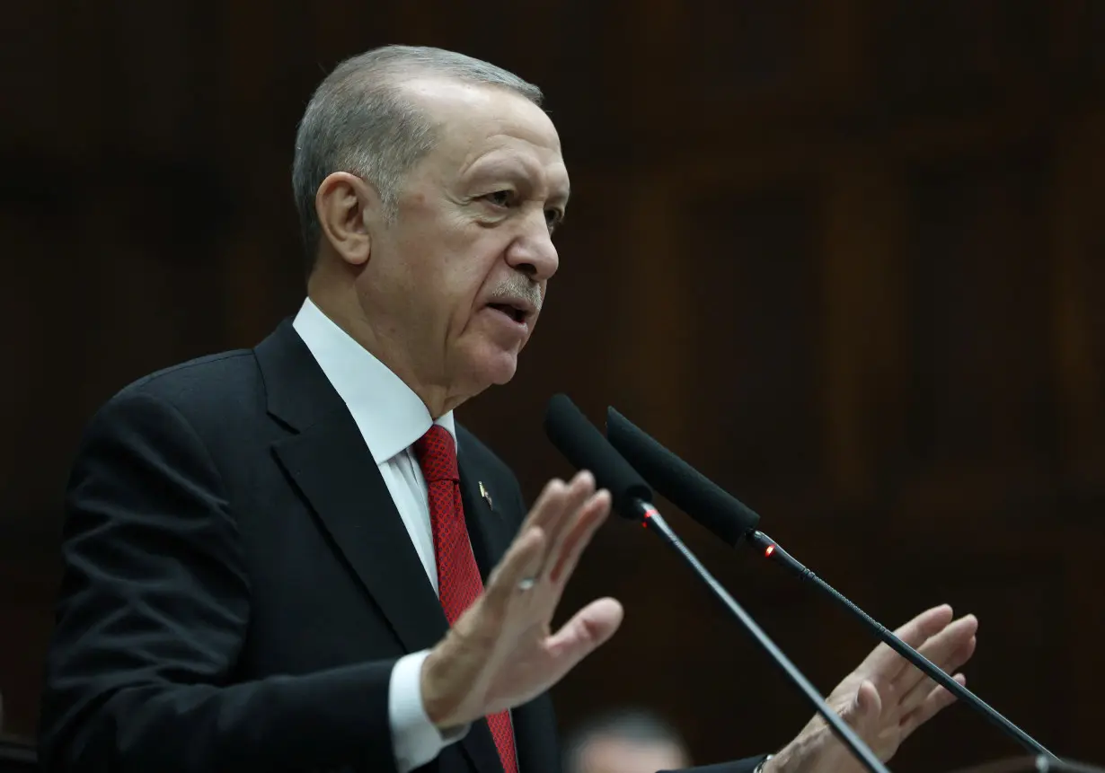 Turkey's President Erdogan addresses AKP lawmakers at the Parliament in Ankara