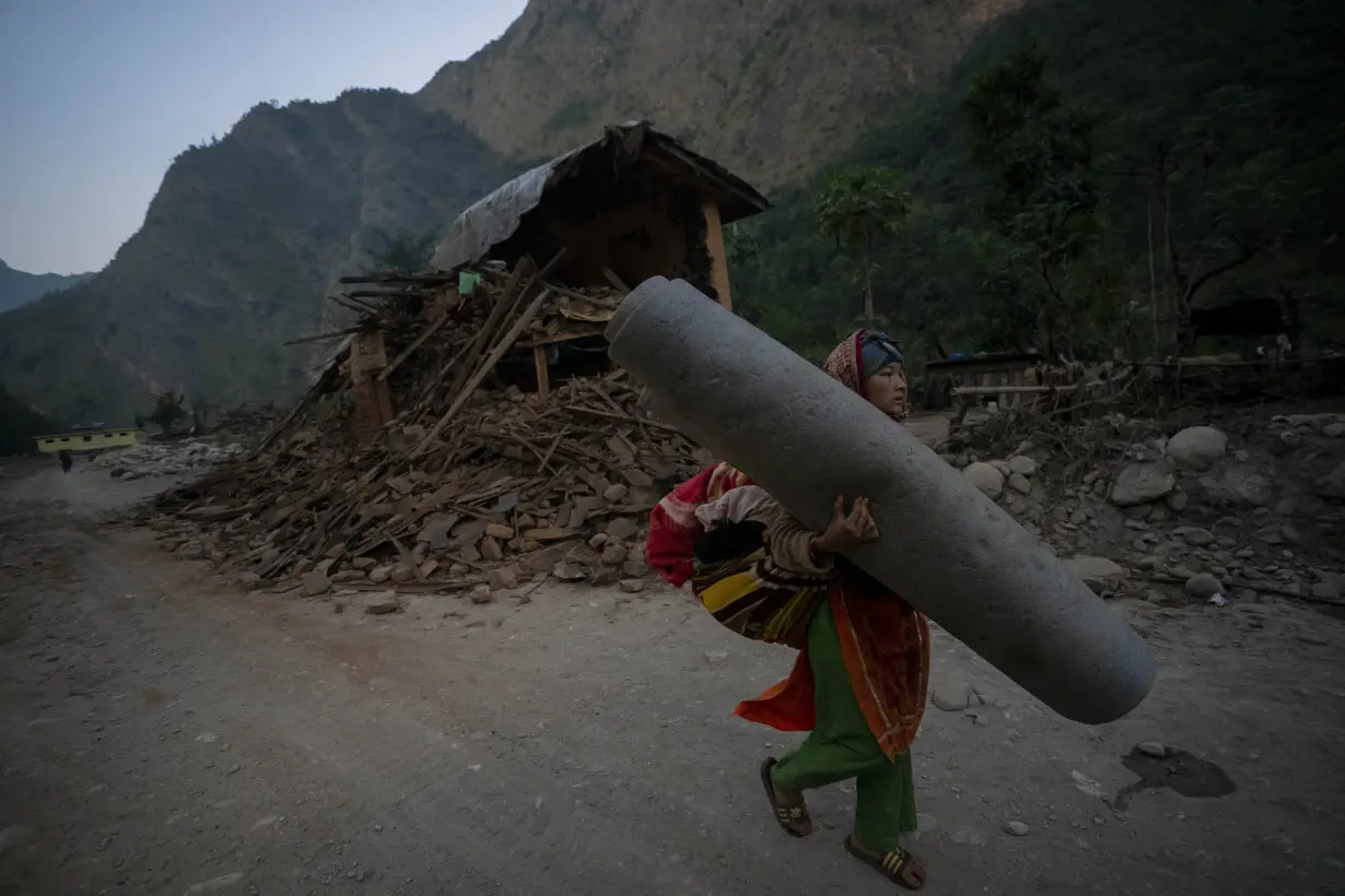 Nepal villagers cremate loved ones who perished in an earthquake that killed 157 people