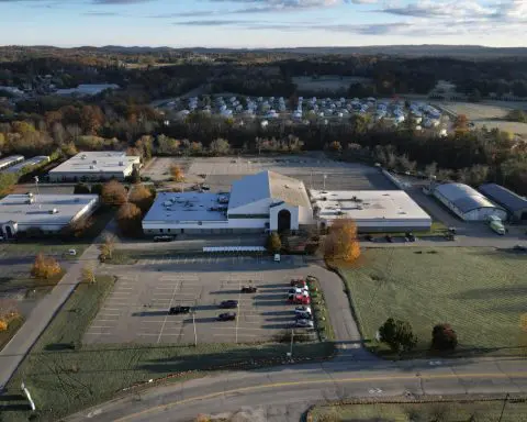 High school football rivals in Maine come together in emotional game after mass shooting