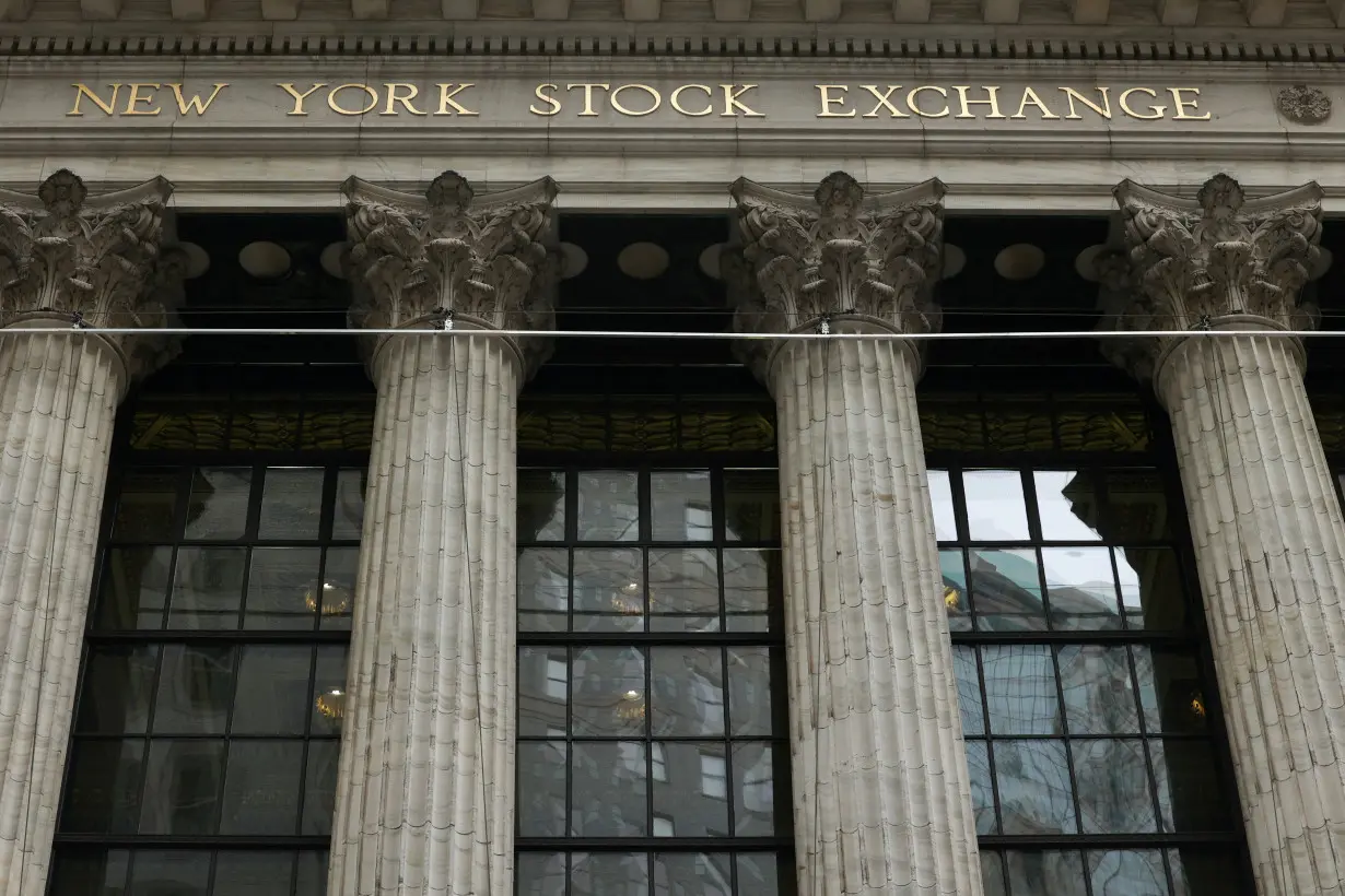 FILE PHOTO: Scenes near Wall Street and the New York Stock Exchange (NYSE), in New York