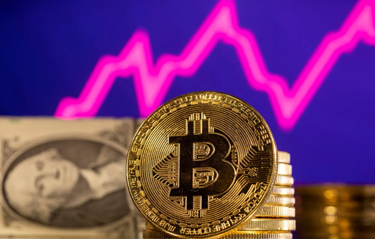 FILE PHOTO: Illustration shows representations of cryptocurrency Bitcoin