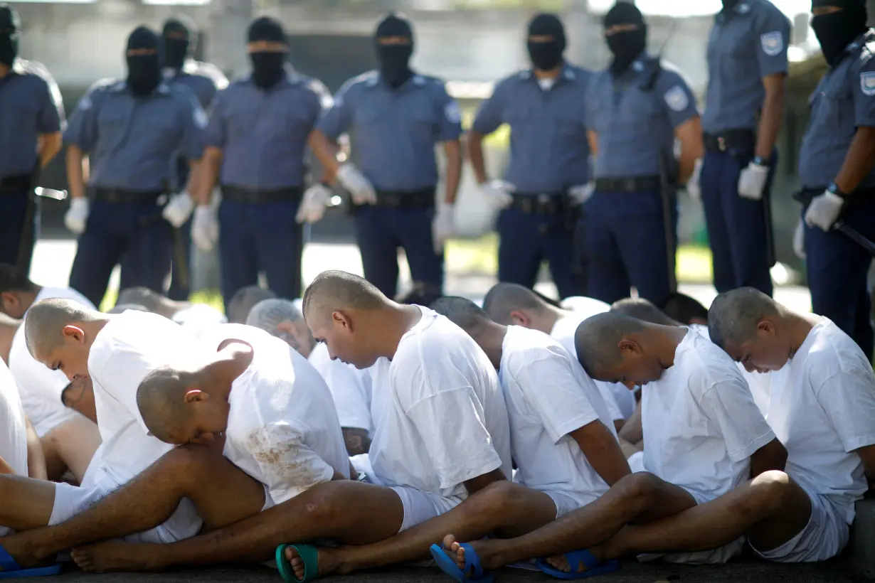 FILE PHOTO: Mara Salvatrucha (MS-13) gang members wait to be escorted upon arrival at the maximum-security jail in Zacatecoluca