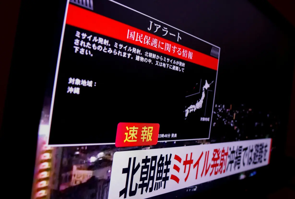 A TV screen displays a warning message called 