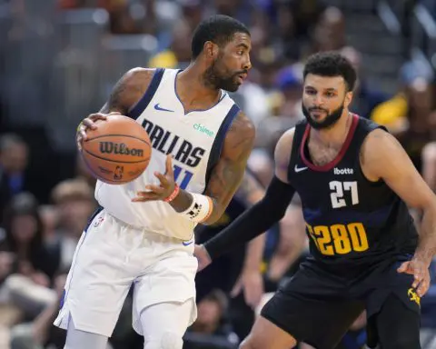 Jokic scores 33 points, leads Nuggets to 125-114 win over Mavericks in NBA tournament opener