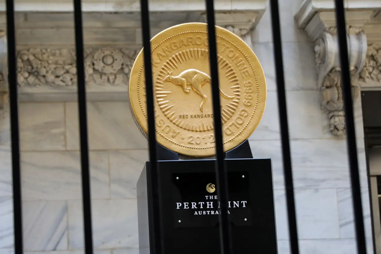 The world's largest gold bullion coin, the Australian Kangaroo One Tonne Gold Coin, is displayed outside the NYSE in New York