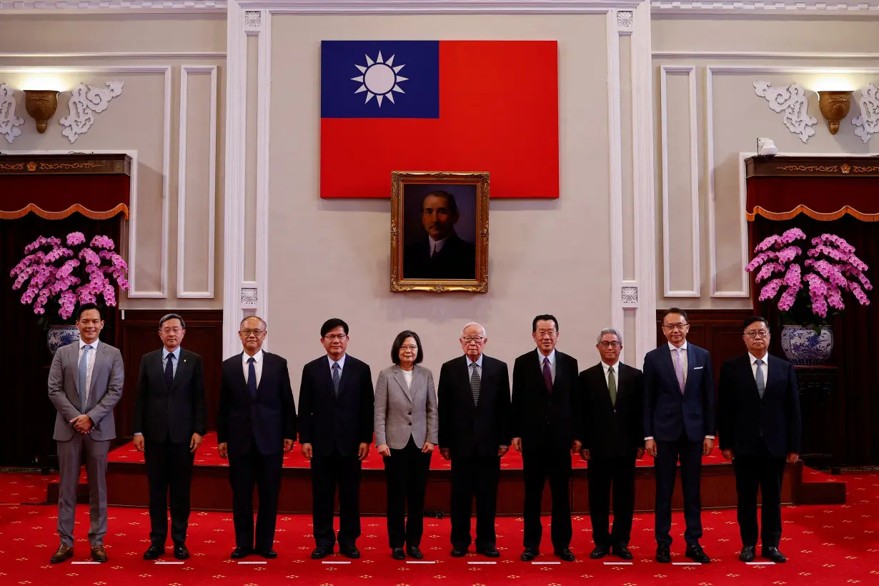 Taiwan's President Tsai Ing-wen poses for a photo with Taiwan's APEC representative and TSMC founder Morris Chang at a press conference in Taipei,