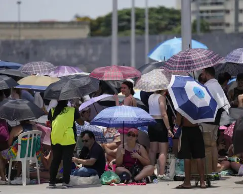 Taylor Swift postpones Rio de Janeiro show, citing record heat a day after fan dies during concert