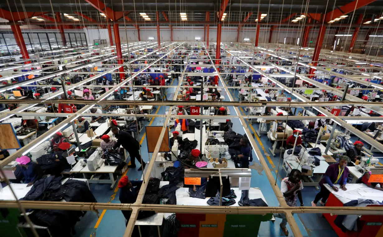 FILE PHOTO: Kenyan workers prepare clothes for export at the United Aryan EPZ factory in Ruaraka district of Nairobi