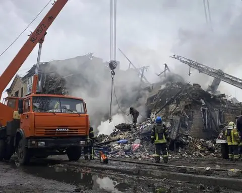 Russian missile strikes in eastern Ukraine rip through buildings, kill 2 and bury families in rubble