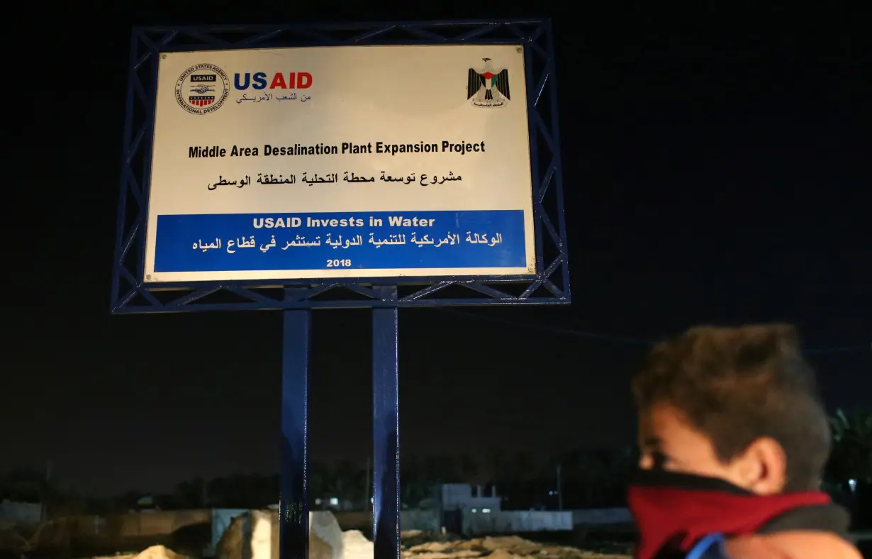 FILE PHOTO: Sign of a USAID project is seen in the central Gaza Strip