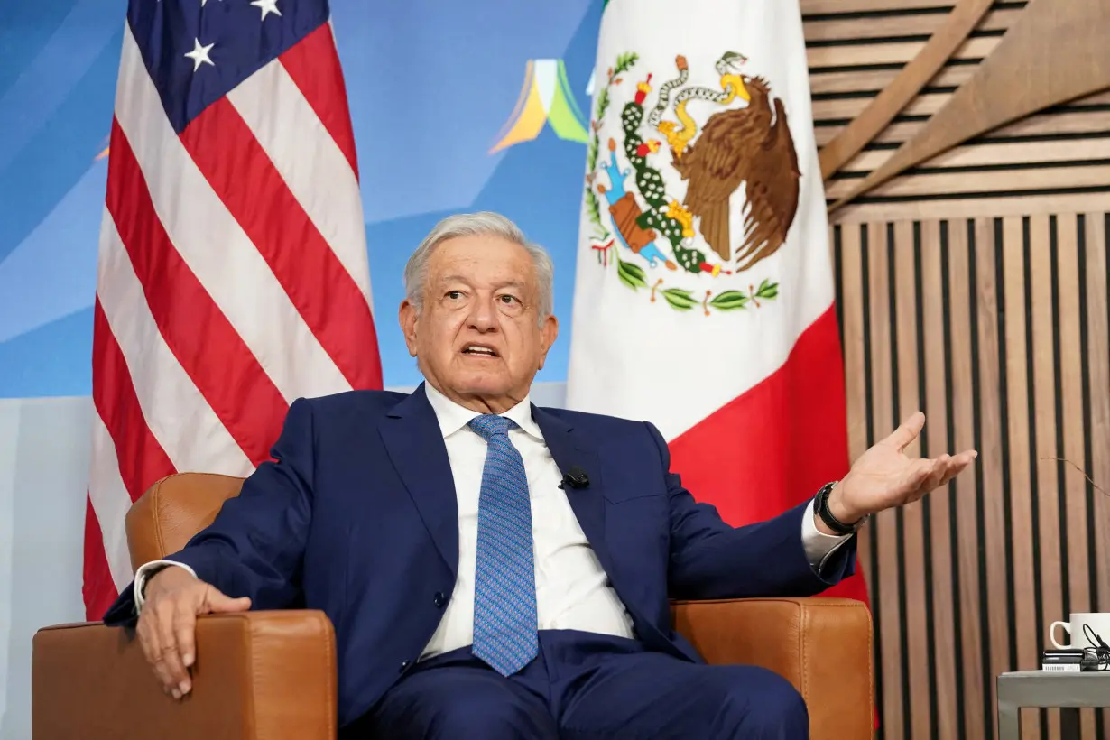 FILE PHOTO: Mexican President Lopez Obrador gestures during meeting with U.S. President Biden