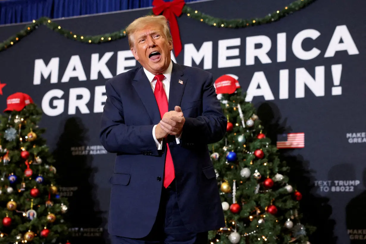 FILE PHOTO: Republican presidential candidate and former U.S. President Trump attends a campaign event in Waterloo, Iowa