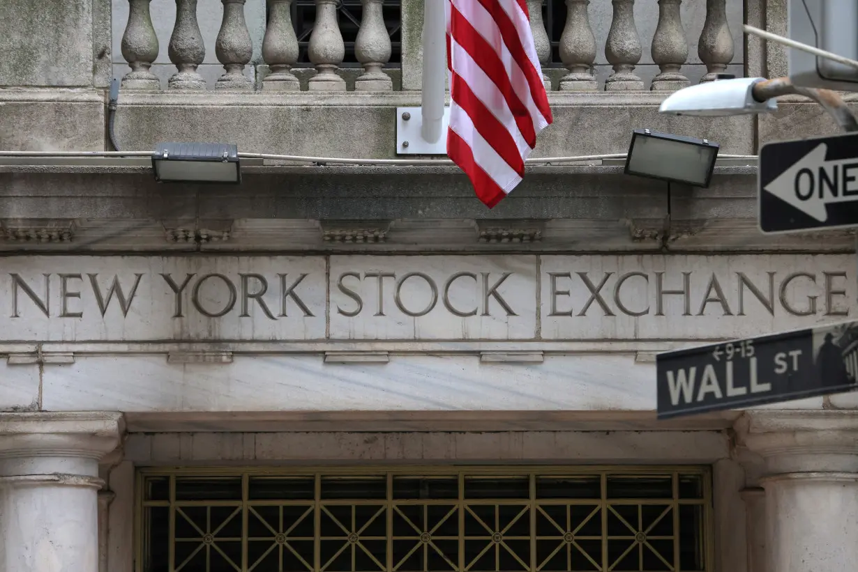 FILE PHOTO: Signage is seen at the New York Stock Exchange (NYSE) in Manhattan, New York City