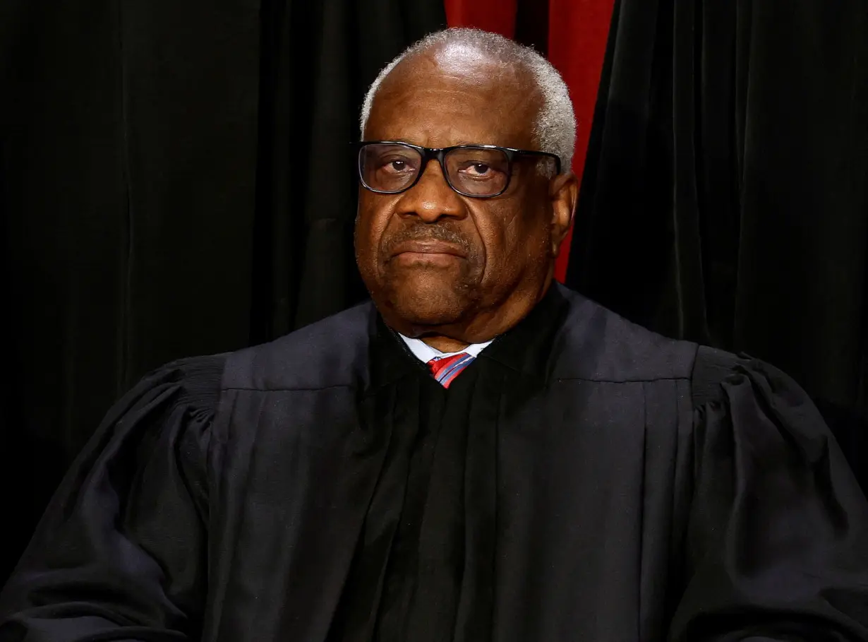 FILE PHOTO: U.S. Supreme Court justices pose for their group portrait at the Supreme Court in Washington