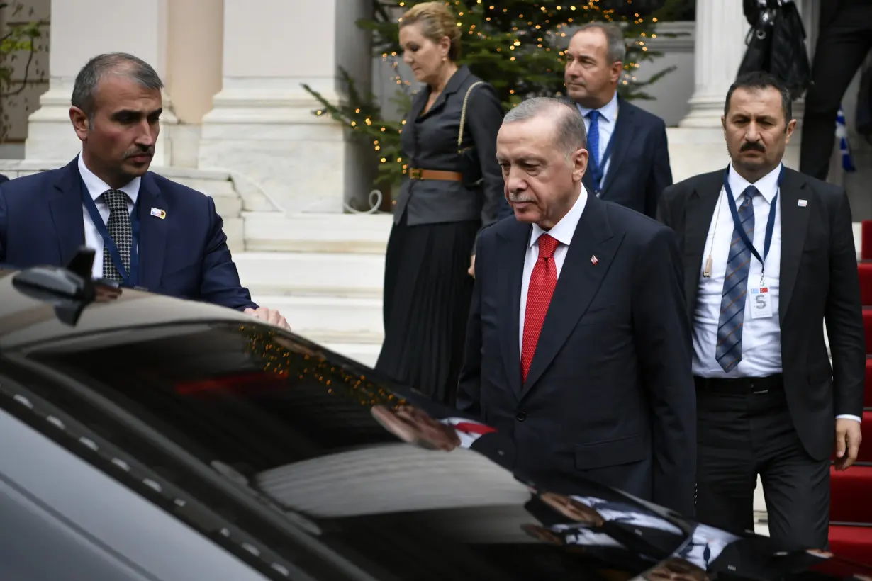 Turkish and Greek leaders turn on the charm in Athens as they vow to leave years of animosity behind