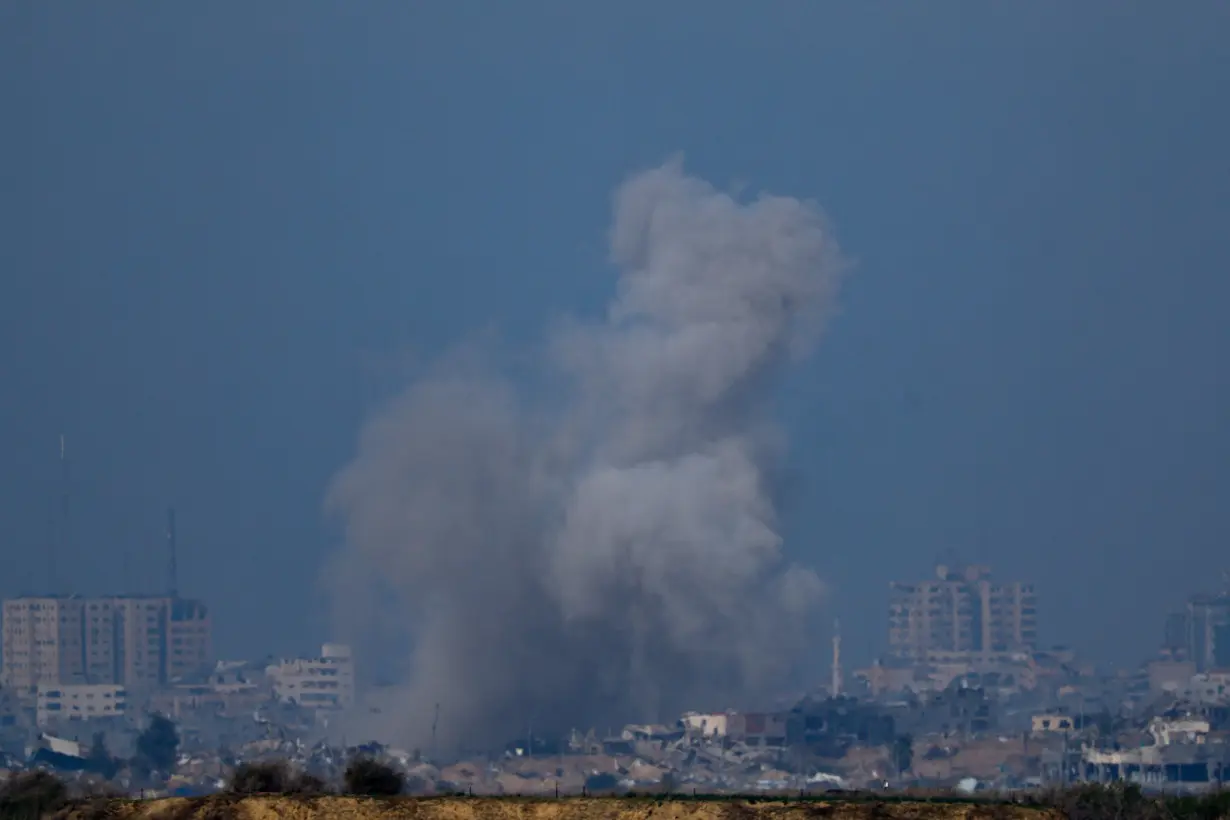 Smoke rises above Gaza, as seen from Southern Israel