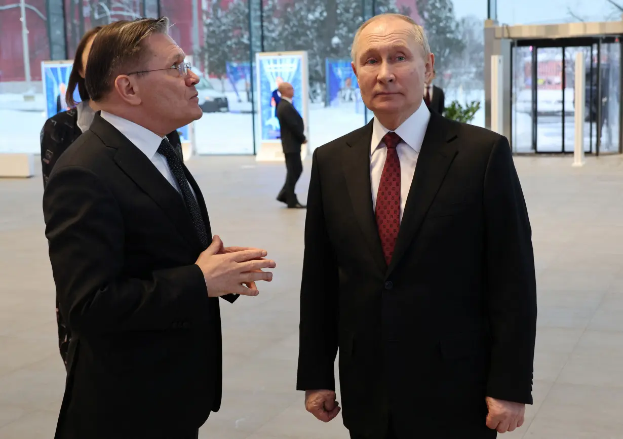 Russian President Putin visits an exhibition in Moscow