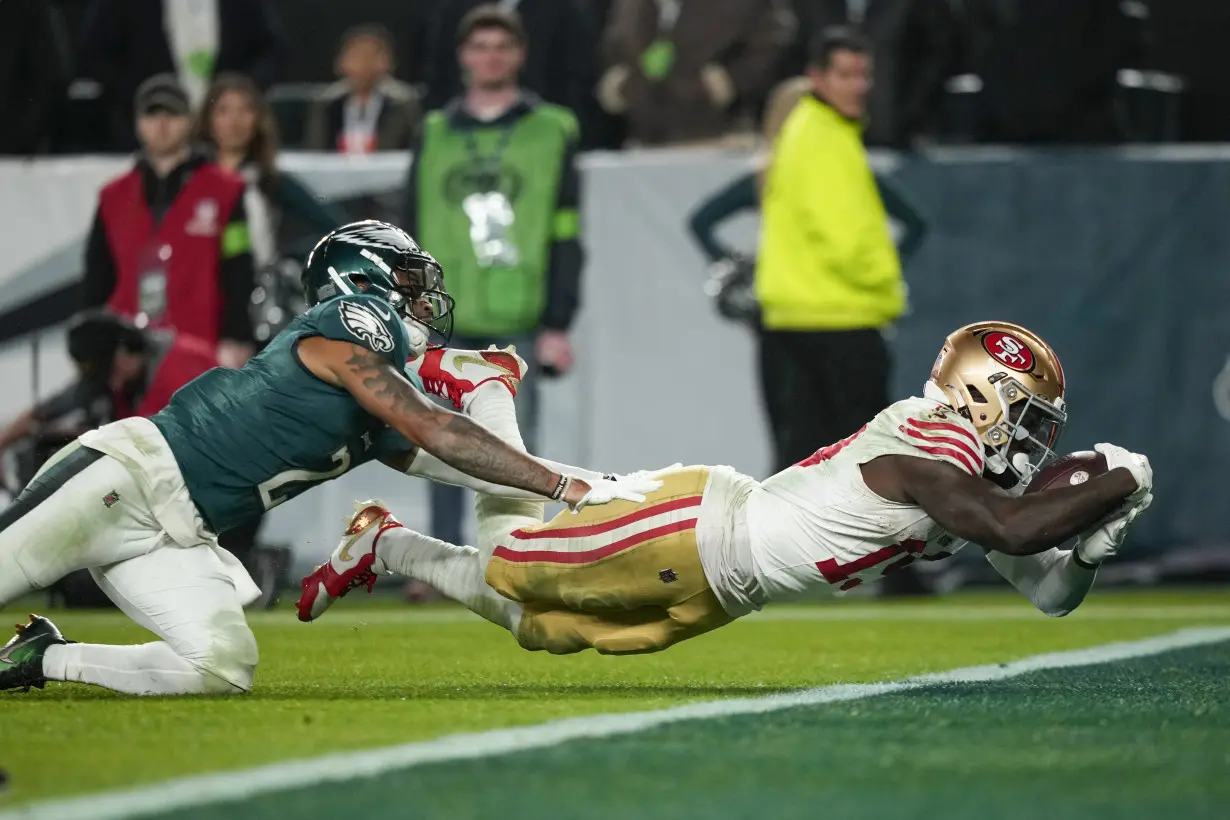 San Francisco's Brock Purdy throws 4 TD passes as 49ers thump injured Hurts, Eagles 42-19