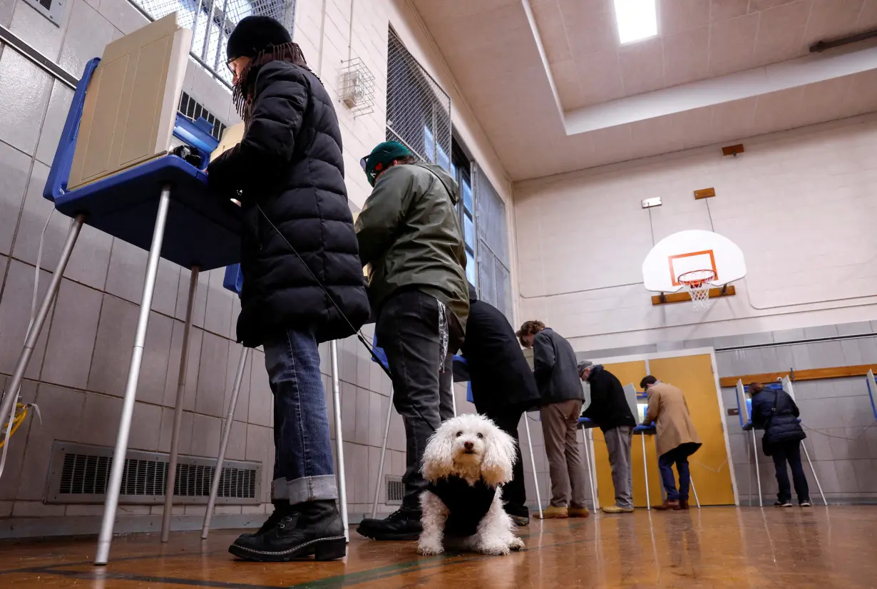 FILE PHOTO: Voters cast their ballots in Wisconsin for Supreme Court