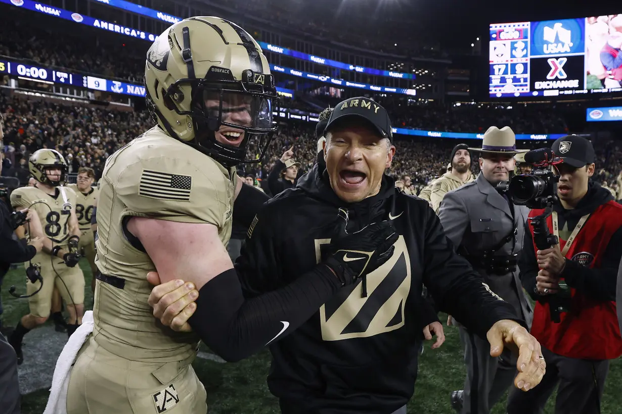 Army holds on with goal-line stand in final seconds, beats Navy 17-11