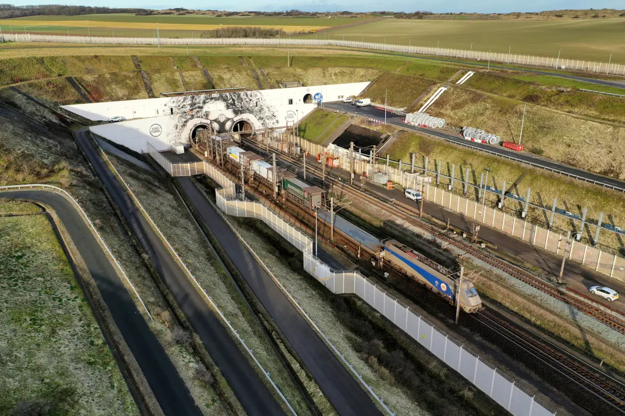 FILE PHOTO: An Eurotunnel freight shuttle enters the Channel Tunnel in Coquelles