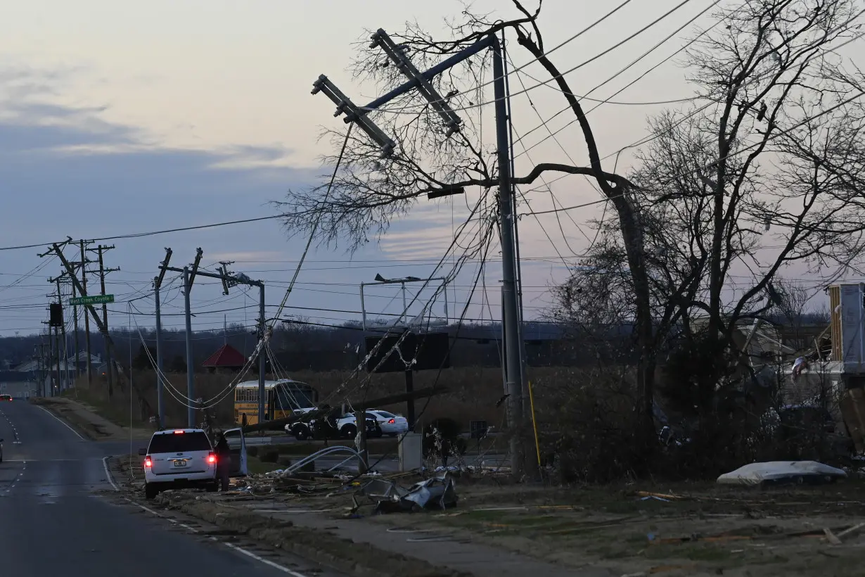 Tennessee residents clean up after severe weekend storms killed 6 people and damaged neighborhoods