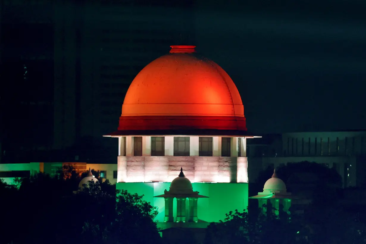 FILE PHOTO: Illuminated Supreme Court building is pictured from the International Media Center during the G20 Summit in New Delhi