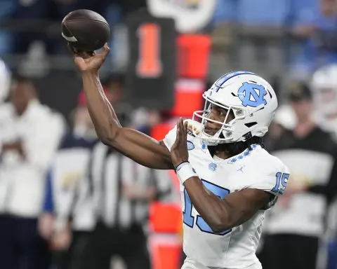 Garrett Greene helps West Virginia beat North Carolina 30-10 in the Duke's Mayo Bowl