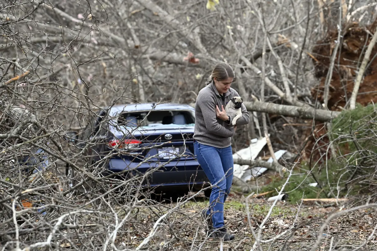 Tennessee residents clean up after severe weekend storms killed 6 people and damaged neighborhoods