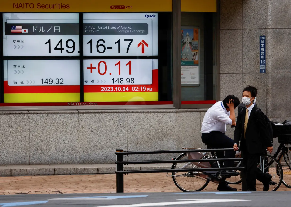Asian stocks mixed ahead of Fed decision; oil prices slump
