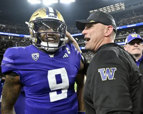 No. 3 Washington rallies to beat No. 5 Oregon 34-31 and secure playoff spot