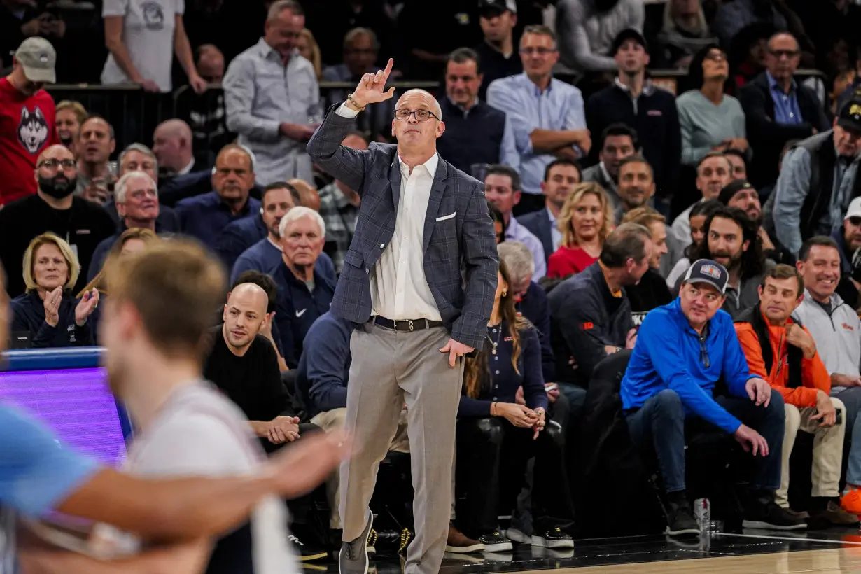 Spencer scores 23 to lead No. 5 UConn past No. 9 North Carolina 87-76 in Jimmy V Classic at MSG