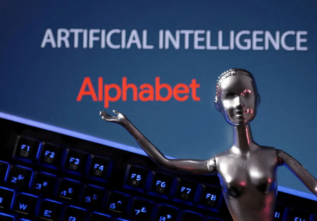 FILE PHOTO: Illustration shows Alphabet logo and AI Artificial Intelligence words