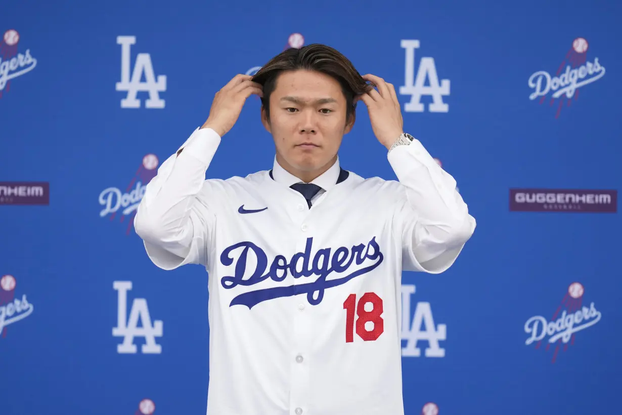 Yoshinobu Yamamoto joins the Los Angeles Dodgers, vows to compete for championships alongside Ohtani