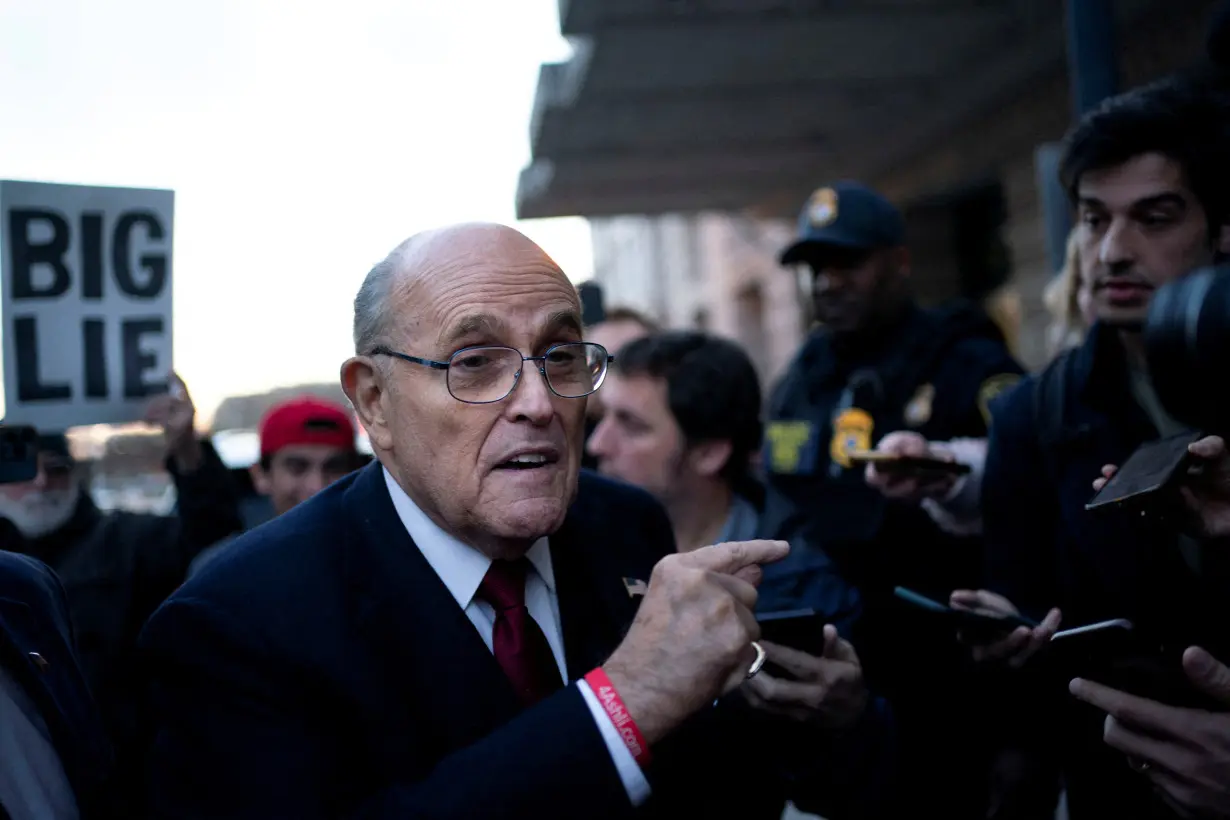 FILE PHOTO: Former New York Mayor Rudy Giuliani departs defamation lawsuit at the District Courthouse in Washington