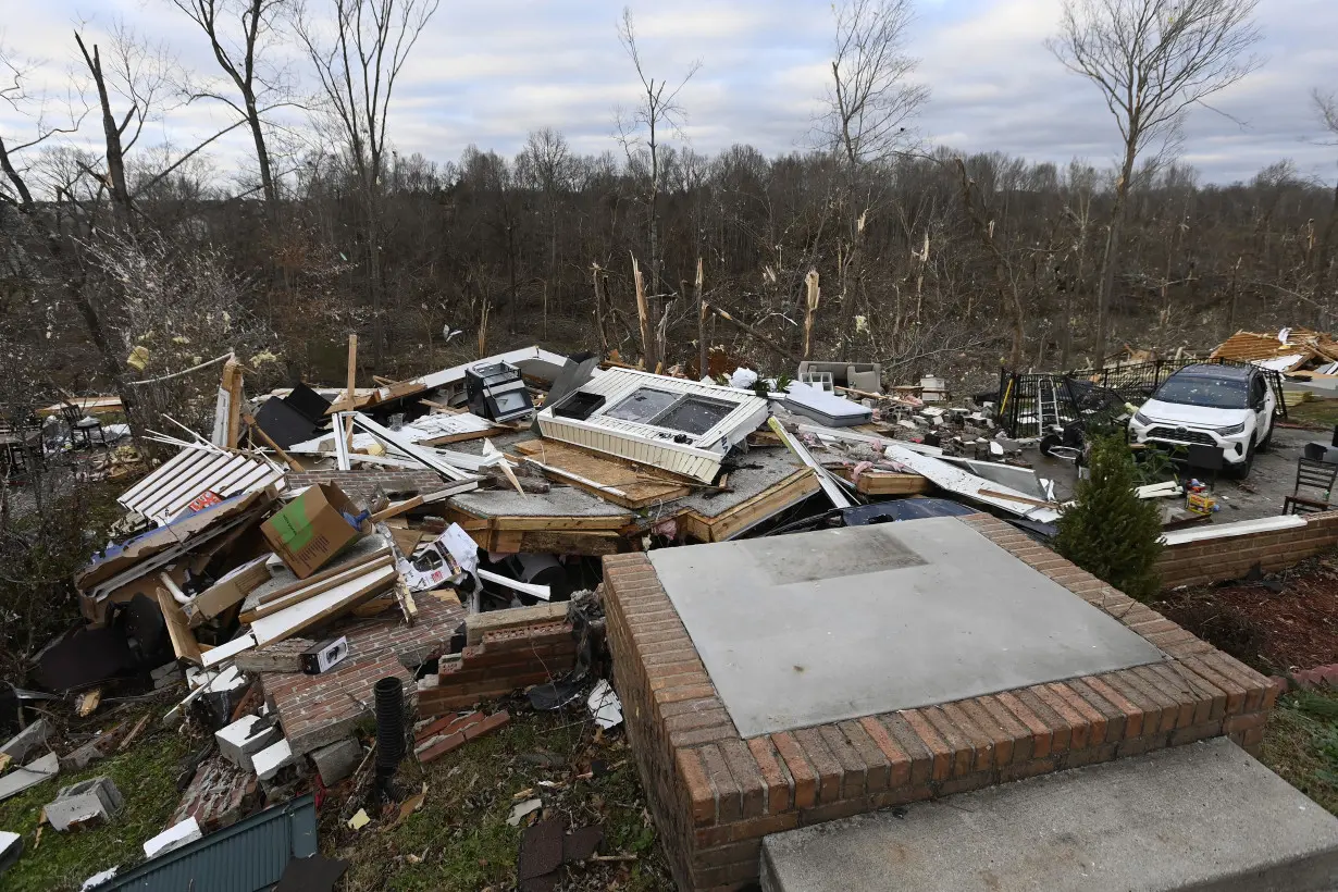 Tennessee residents clean up after severe weekend storms killed 6 people and damaged neighborhoods