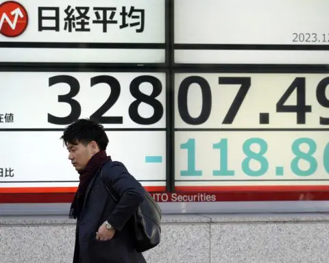 Stock market today: Asian shares are mostly higher after the Dow hits a record high, US dollar falls