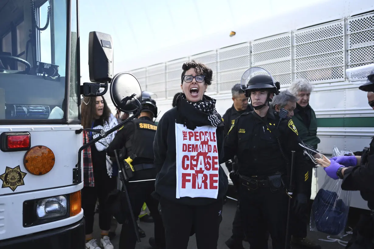 San Francisco prosecutors begin charging 80 protesters who blocked bridge while demanding cease-fire