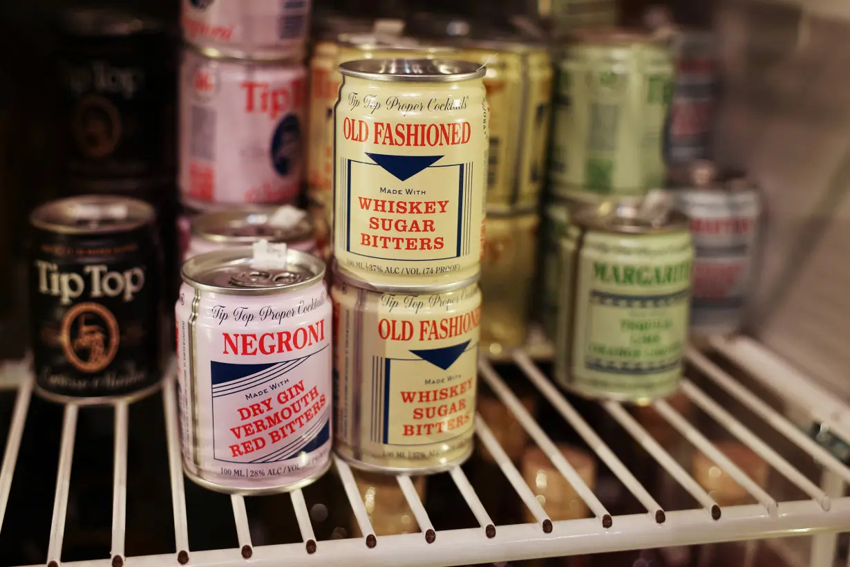 Drinks sit on display in a refrigerator at a wine and spirits store in New York City