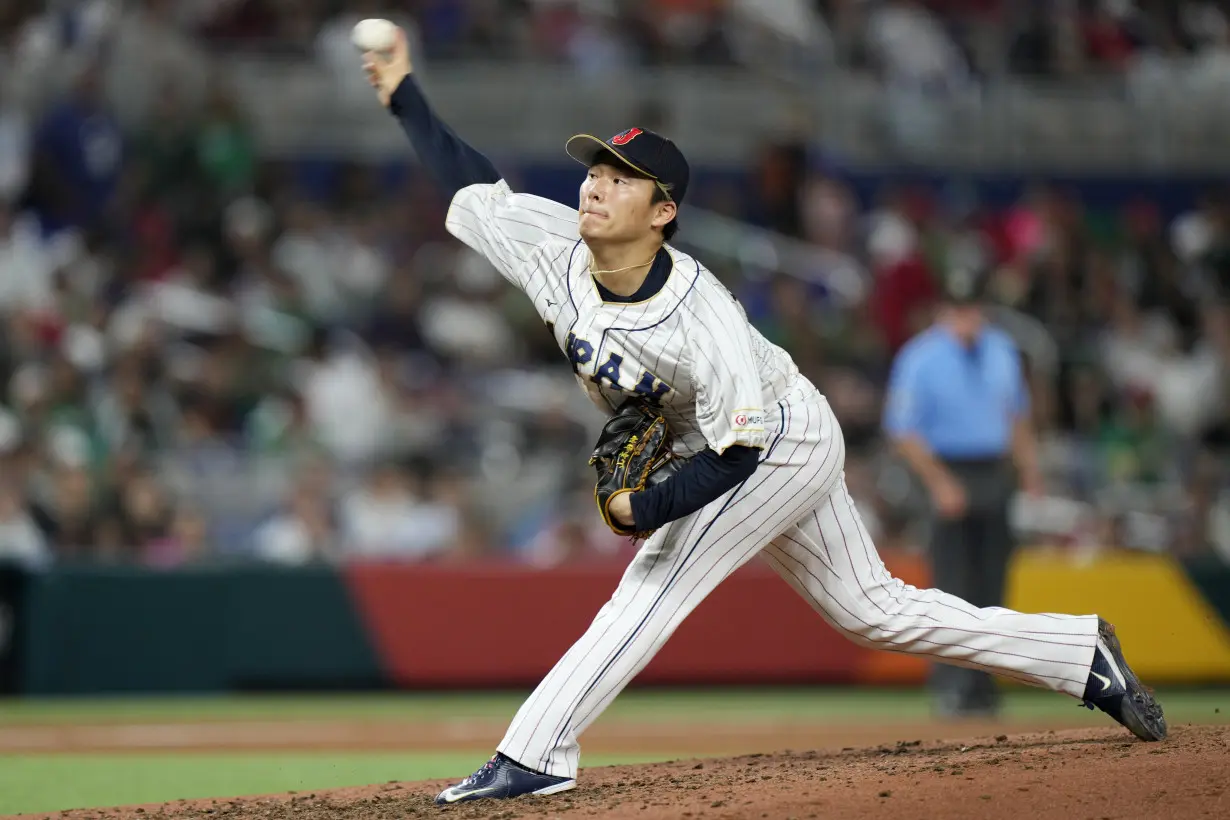 Yoshinobu Yamamoto joins the Los Angeles Dodgers, vows to compete for championships alongside Ohtani