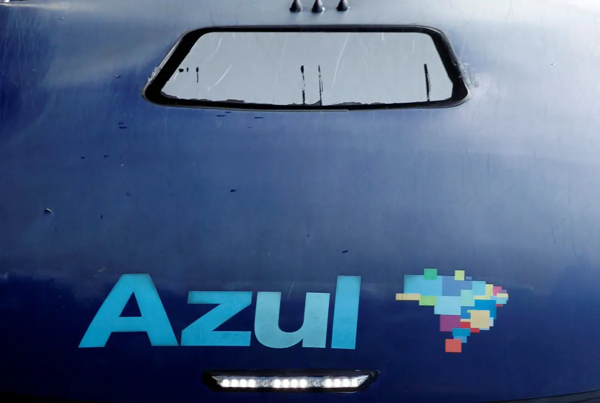 The logo of Brazil's airline Azul is seen on the roof of a bus at Viracopos airport in Campinas