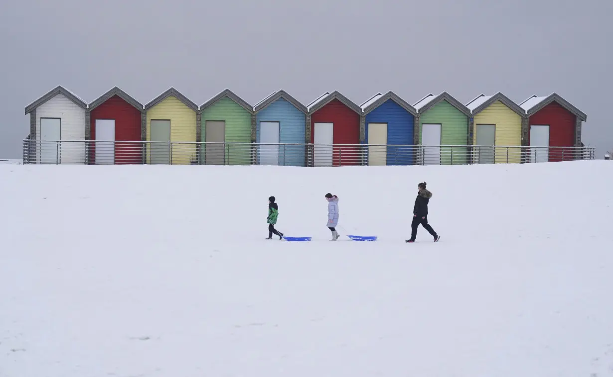 Heavy snow in northern England causes havoc on highways and knocks out power