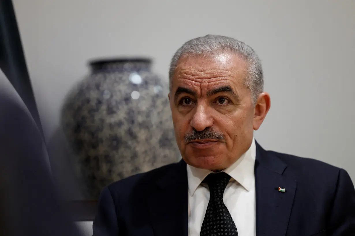 Palestinian Prime Minister Mohammad Shtayyeh speaks to Reuters at his office in Ramallah