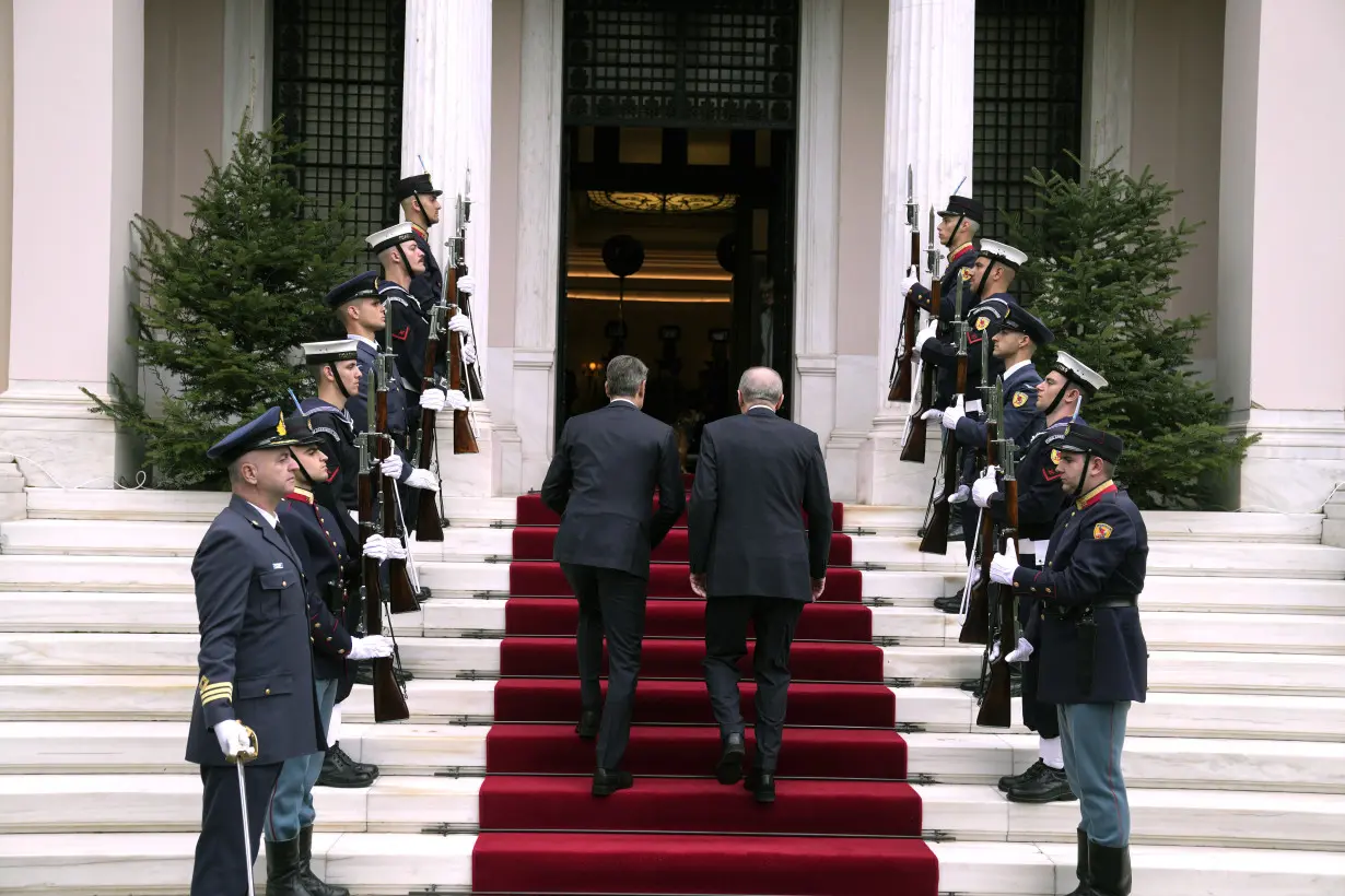 Turkish and Greek leaders turn on the charm in Athens as they vow to leave years of animosity behind