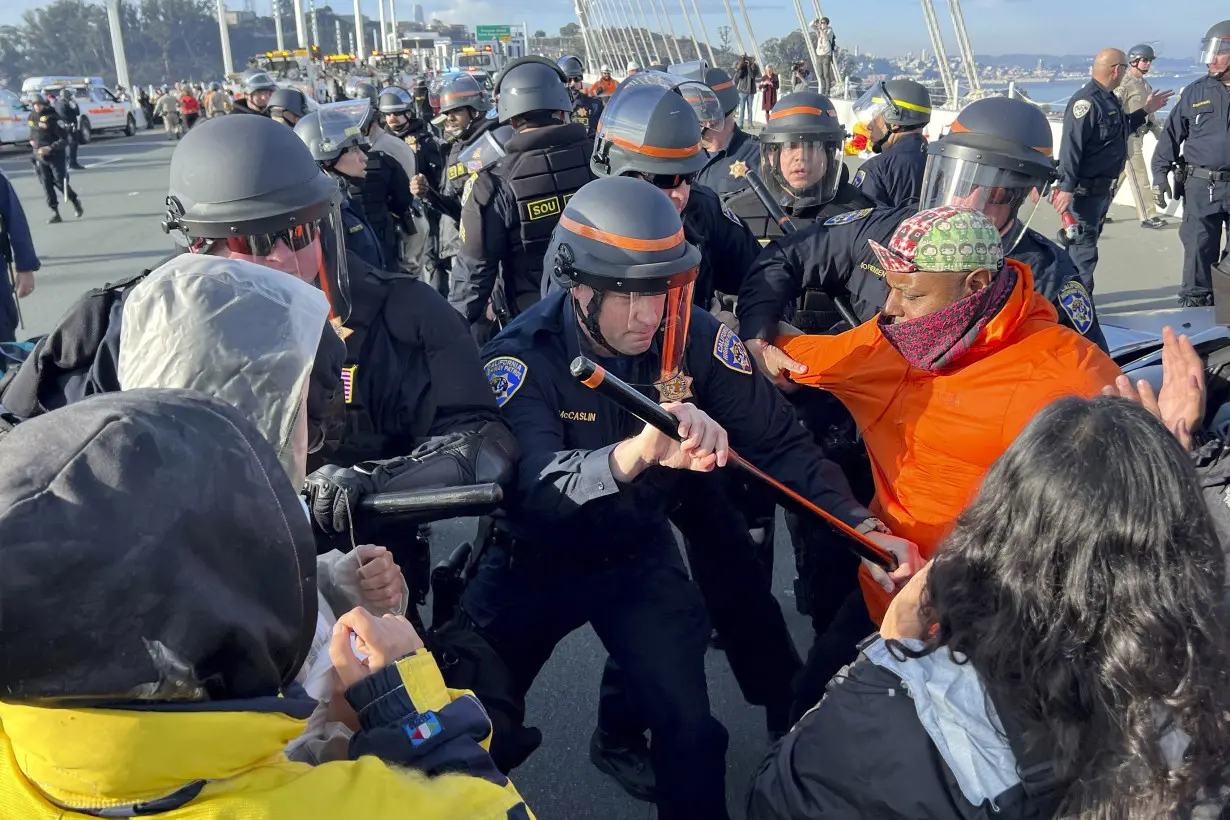 San Francisco prosecutors begin charging 80 protesters who blocked bridge while demanding cease-fire