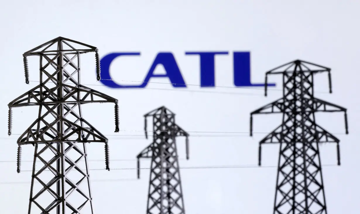 FILE PHOTO: Illustration shows Electric power transmission pylon miniatures and CATL logo